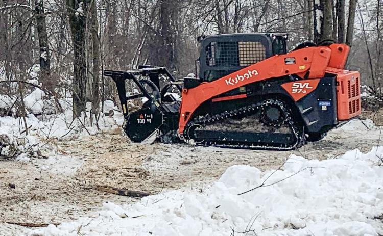 Forestry mowing of invasive plant species being done at Gladwin City Park.