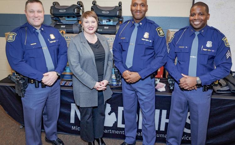 Pictured left to right are: Insp. Barry Schrader, MSP Field Services Bureau; MDHHS Director Elizabeth Hertel; MSP Director Col. James F. Grady II; Sgt. Ronnie Evans, MSP Planning, Research and Accreditation Section.