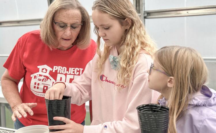 Fun hands-on activities included planting seeds in the CTE greenhouse.
