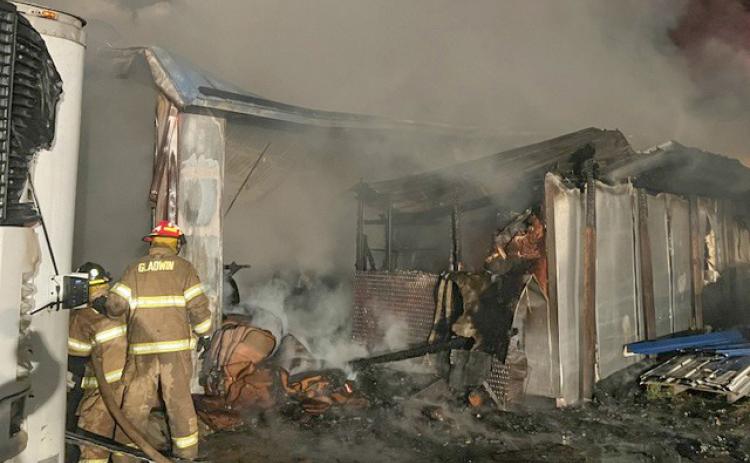Early morning fire ravages Lambert’s Meat Market