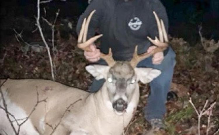 Nicolas Patnode, 19, of Kalkaska poses with an illegal 9-point deer he killed in 2022. Patnode and Zander Garrett face a combined 14 charges after torturing a porcupine and illegally hunting throughout the county during October-November 2022. Both Kalkaska men are due back in court on May 20.
