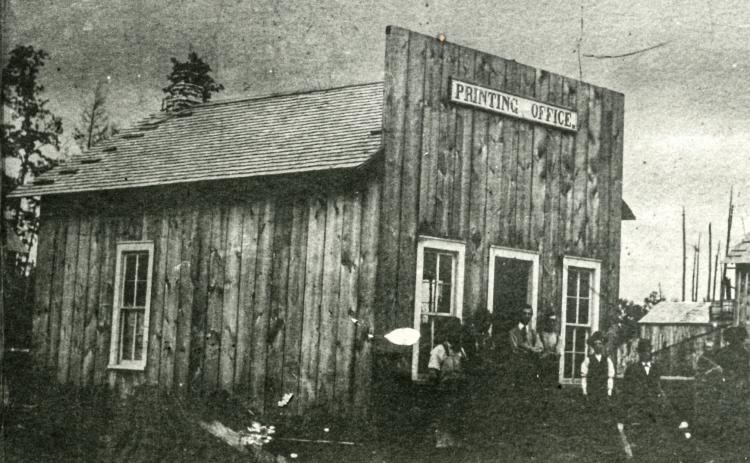 This photo depicts the original building of the Gladwin County Record circa 1880.