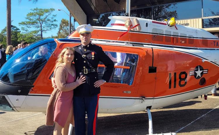 Pictured are Auden Fortier and fiancé, Haley Marsh.