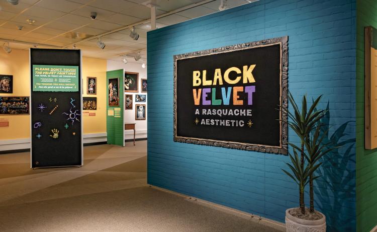 The Michigan History Museum’s new exhibit explores black velvet paintings and their connection to Latino history. The museum’s exhibits team created and designed the exhibit with help from three guest curators, who loaned paintings from their personal collections.
