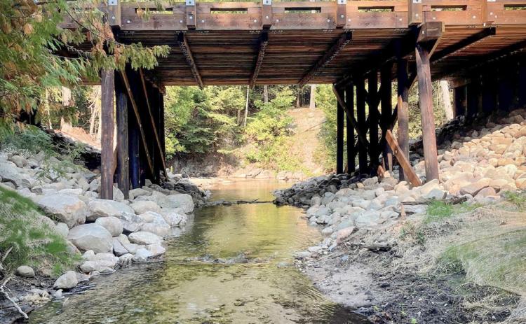 Wycamp Creek Road-Stream Crossing was replaced with a new timber bridge in September 2024, reconnecting 1.35 miles of stream for white and longnose suckers, culturally significant fish species for Little Traverse Bay Band of Odawa Indians. (Photo courtesy Little Traverse Bay Band of Odawa Indians)