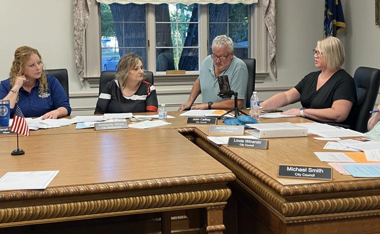 Gladwin City Council Member Jaimie Esiline makes a point while Mayor Sarah Kile, City Administrator Kimberly Hines and Council Members John Caffrey and Linda Winarski listen in during last Wednesday’s Special Meeting.