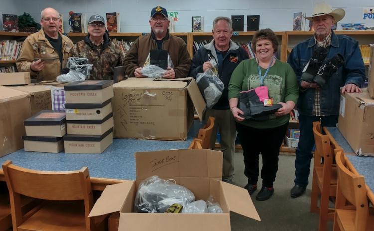 UMC Men’s Club donate boots for local kids