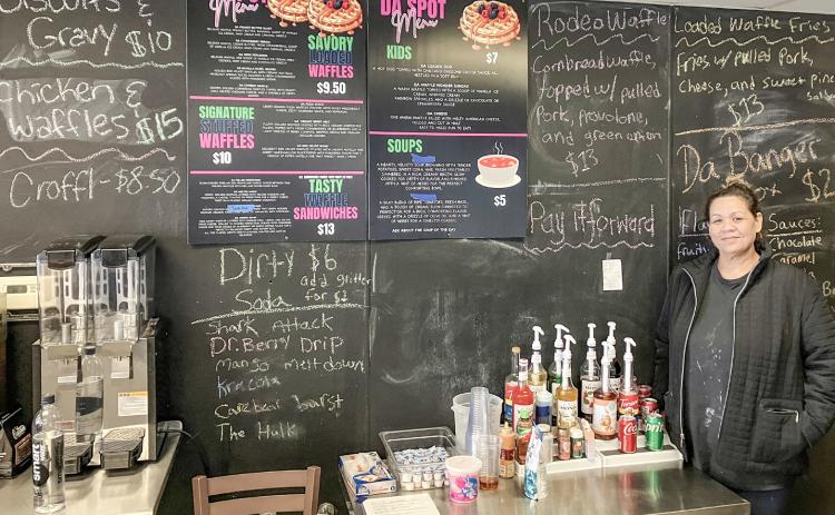 Owner Shariece Simbahon stands by her menu at Da Spot, a restaurant in Gladwin that offers waffles and a lot more.
