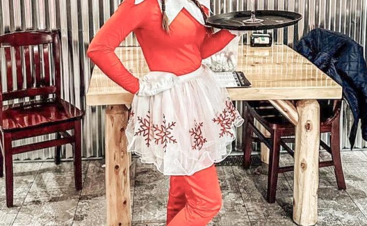 Ali the Elf stopped by Beaverton Tavern to showcase her waitressing skills.