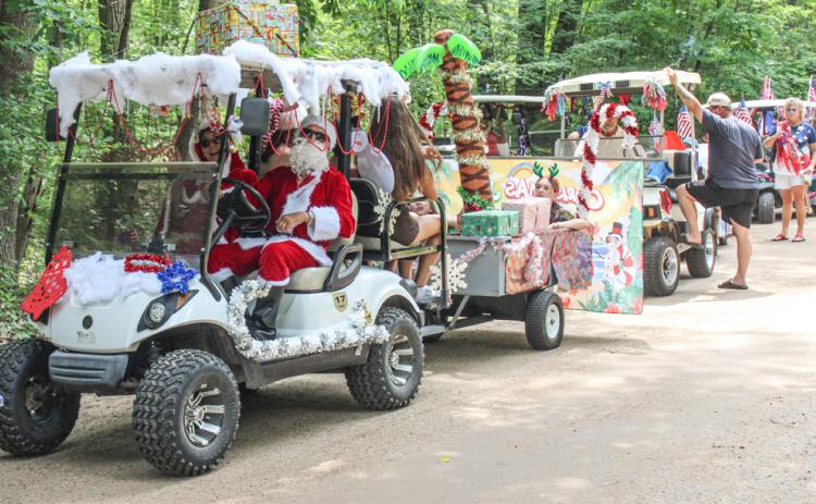 The eighth annual Wiggins Lake Golf Cart Parade was held on Saturday, July 1. Golf carts could be designed with any theme and there were prizes for first, second, and third place.