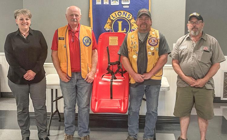 Pictured from left to right are Beaverton City Manager Shannon Siprilla, Lions Treasurer Al Bornick, President Bob Killian, and Beaverton Mayor Ray Nau.