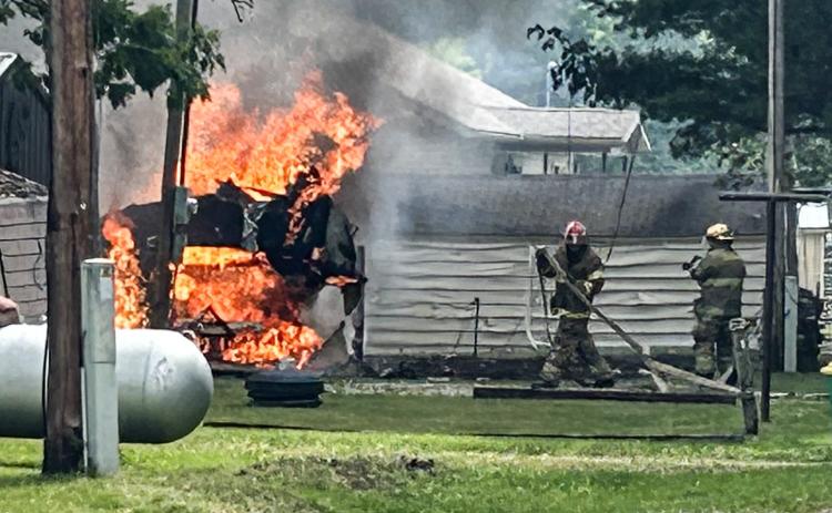 TRAILER ON FIRE IN HAY TOWNSHIP SCORCHES NEARBY BUILDING