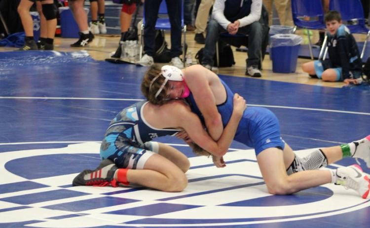 Gladwin’s Ethan Palmateer won the championship at 132 pounds Saturday during a tournament at Remus Chippewa Hills. SCOTT SALOWICH