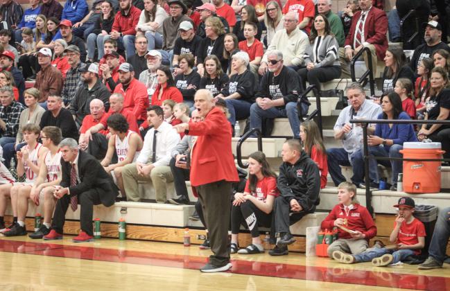 Coach Roy barks out orders from his familiar spot along the sidelines in front of a packed house at Beaverton Friday night in his final home game after 50 years at the helm.