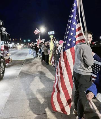 A crowd gathers at the Birch Run overpass along I-75 to show their support for the late Army Specialist Braden Peltier. PHOTO PROVIDED BY ALESIA SULLIVAN