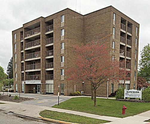Maple Manor handing out Halloween candy