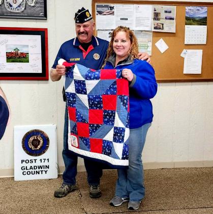 Pictured is Jim Volant (left) who was presented with a Threads of Tribute Quilt at the regular meeting of the Gladwin County American Legion Post 171 on April 20, 2023, by Gladwin Mayor Sarah Kile (right) who nominated him for his service during the Vietnam Era.