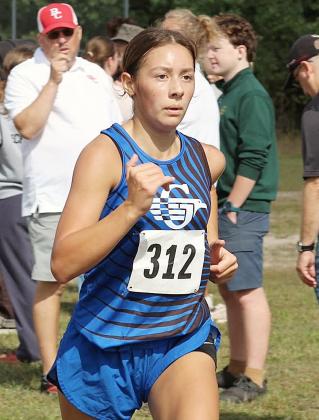 Elizabeth Huisjen and the Gladwin girls’ cross country team opened the season Saturday with a good performance against top competition at the Pete Moss Invitational.