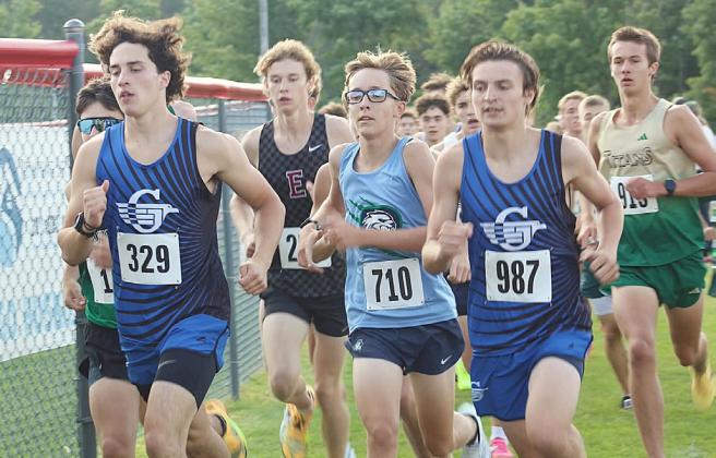 Gladwin’s Myles Robinson (left) and Gabe Piach each earned medals in a season-opening race at Benzie Central on Saturday.