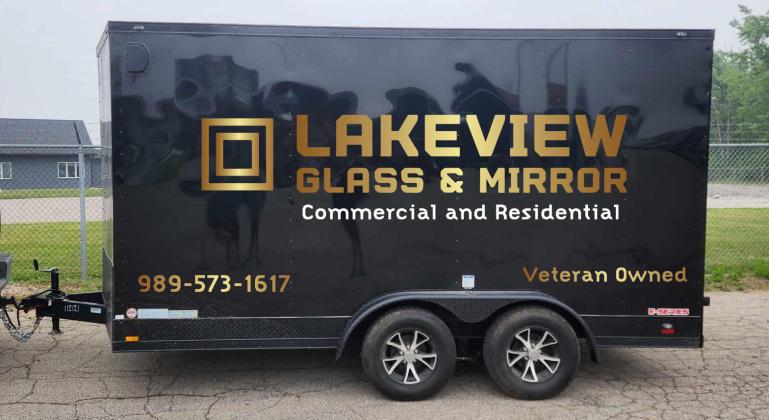 Pictured is the Lakeview Mirror &amp; Glass enclosed trailer.