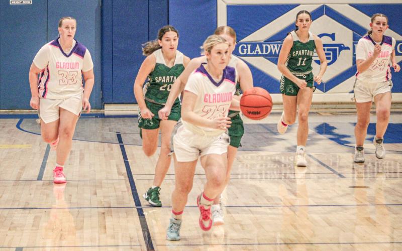 Liz Winchester leads the charge toward the basket during Gladwin’s battle with Pinconning on Coaches Vs. Cancer Night last week.