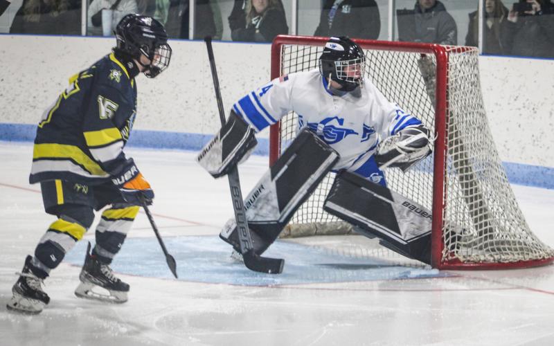 Gladwin goalie Preston Willert guards his cage during Saturday’s mercy ruleshortened 9-1 victory over the MId-Michigan Raptors.