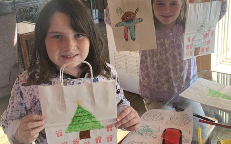 Left: Caroline and Lily, daughters of Tyler and Angela McLaren and granddaughters of Tina and Mike Haines, Kim and Pat Savage and Mark and Amy Baker, all from Beaverton.