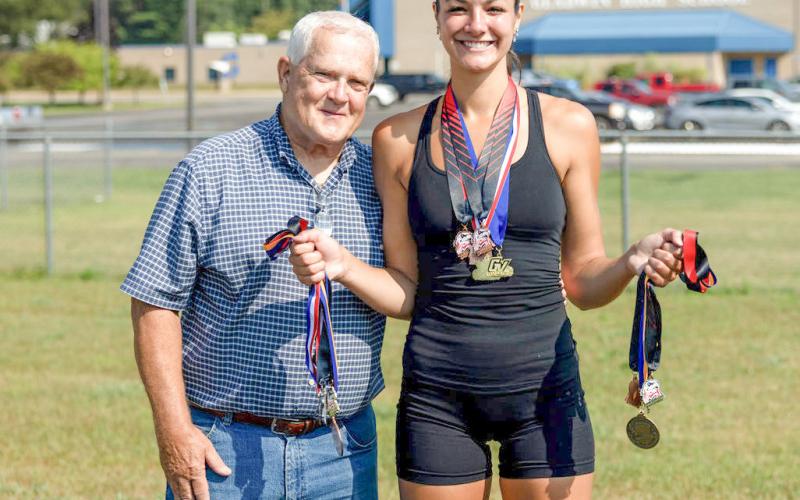 Ava Gary, pictured with her Gladwin High School Track Coach, Kernie Gilliam.