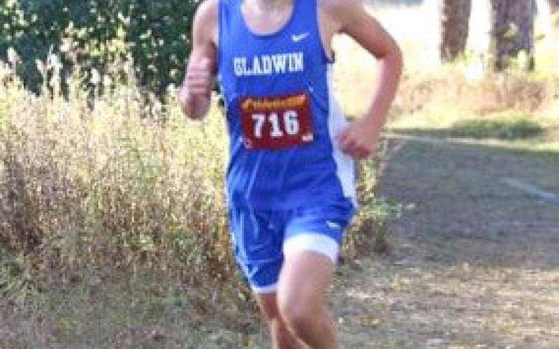 Gladwin’s Elijah Christensen represents Michigan at the recent Mid-East XC Championships in Ohio after earning All-State honors. He and teammates Seth Mead and Ben Verellen were First Team All-Conference in the JPC.