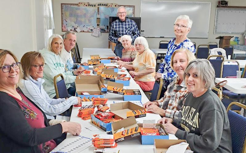 MARSP-Gladwin County Chapter volunteers participate in a work-bee to prepare candy bars to distribute in appreciation to Gladwin and Beaverton School staff.