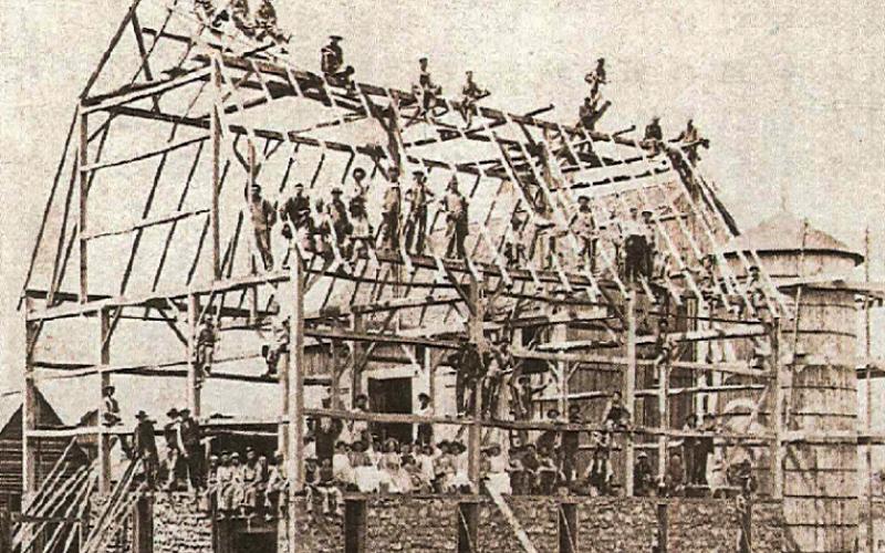 The Powley barn raising on the east side of Hockaday Road in Section 10, later the Sheehan Farm. PHOTO PROVIDED BY JULIE ELLIS