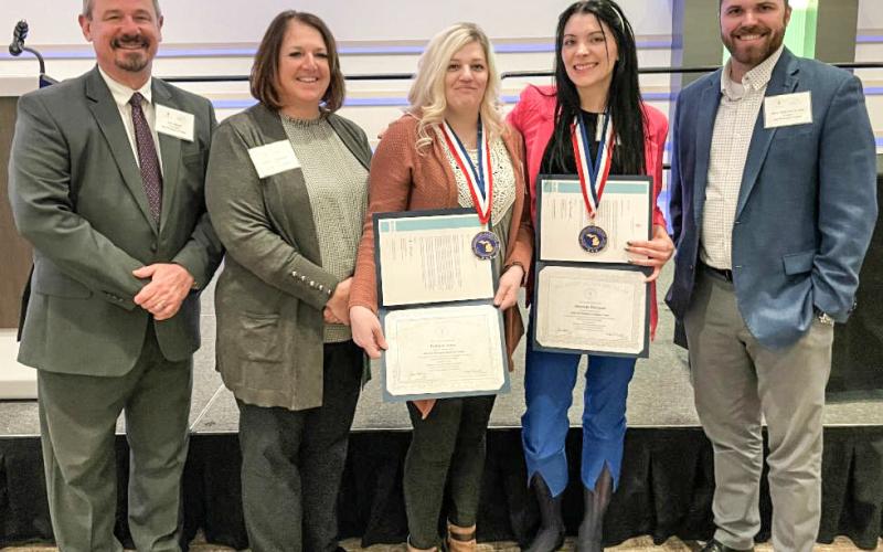 Pictured left to right: Mid Michigan College President, Tim Hood; Mid Michigan College Board of Trustees Chair, Jane Zdrojewski; Brittany Ames, Shantelle Thornton, and Mid Michigan College Trustee, Nate Weisenburger.