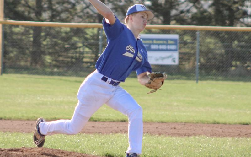 Gladwin pitcher Brady Demory delivers two innings of hitless relief during the first game of Friday’s doubleheader at Pinconning.