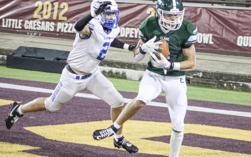 lare’s Jacob Halicek catches a touchdown pass during Friday night’s victory over Ortonville Brandon at Central Michigan University’s Kelly/Shorts Stadium.