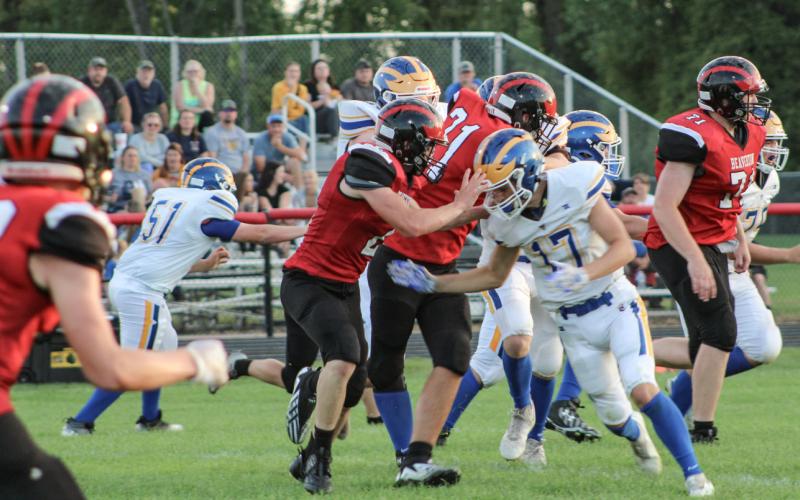 Beaverton Varsity are pictured going head-to-head with Evart.