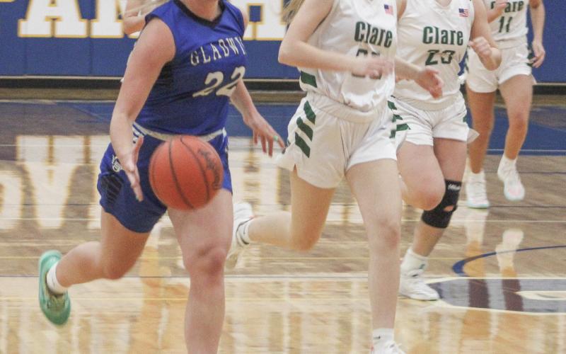 Gladwin’s Lizzie Haines beats the Clare defense down the court during last Wednesday night’s Division 2 district semifinal at Standish.