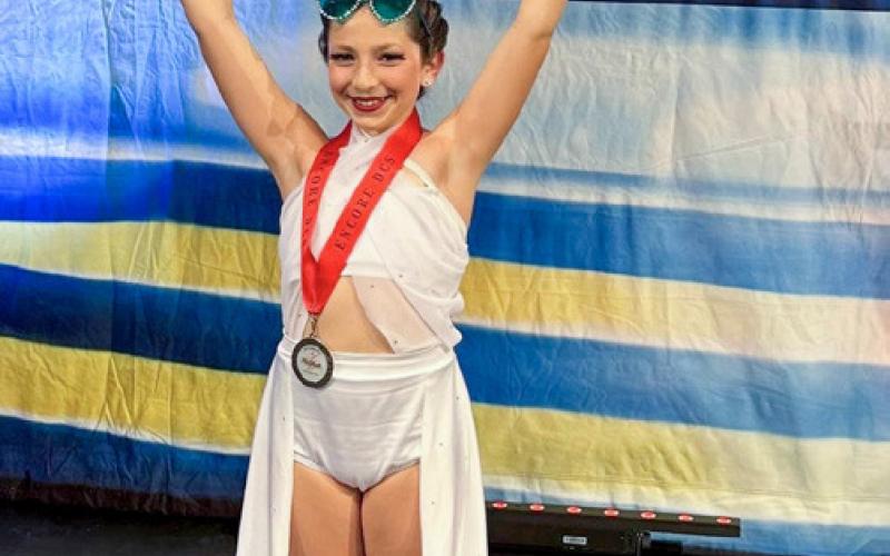 Bella Hand received the top score of all solos/ duets/trios ages 12 and up for her lyrical dance “Never Enough” choreographed by Adrienne Schlitzkus.