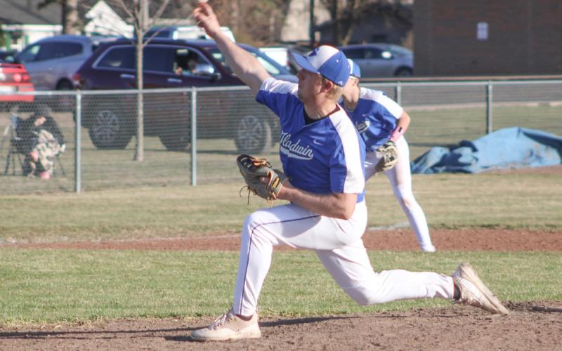 Gladwin’s Scott Inscho delivers a pitch during a recent game. The Flying G’s won four out of six games last week.