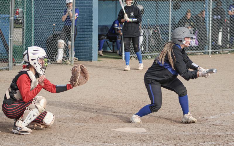 The bunt sign is on for Gladwin batter Addison Tyslicki during last week’s doubleheader sweep at the hands of visiting St. Louis.