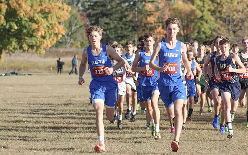 Gladwin’s (left to right) Seth Mead, Ben Verellen and Elijah Christensen head to a 1-2-3 finish Saturday at Mount Pleasant’s Blue and Gold Invitational.