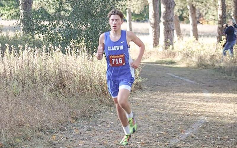 Ben Verellen finished third with a personal-best time to help Gladwin win the team title at the Blue and Gold Invitational Saturday in Mount Pleasant.