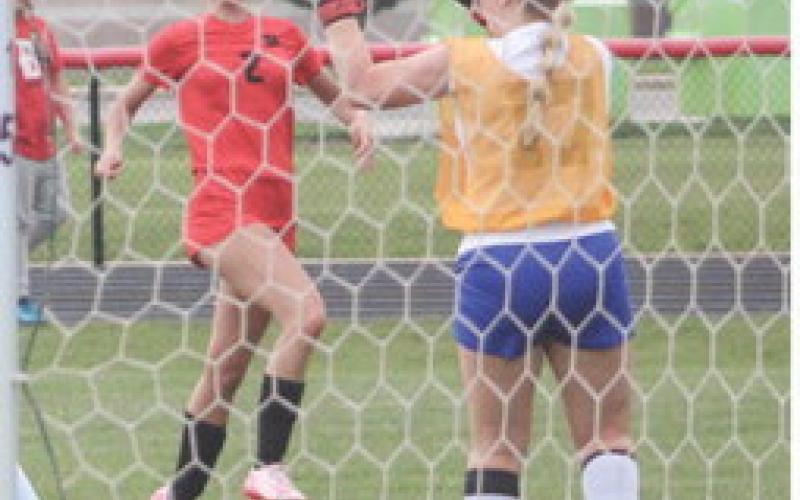 Emily Skotynsky ripped this shot off the post and the rebound bounced off teammate Trinity Danielak and into the net during last week’s big win over Oscoda.