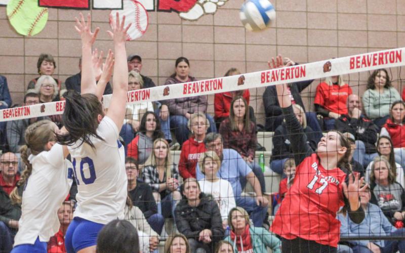 Beaverton’s Kaelyn Fischer goes for the kill during the Beavers five-set loss to Beal City in the Division 3 district finals Thursday.