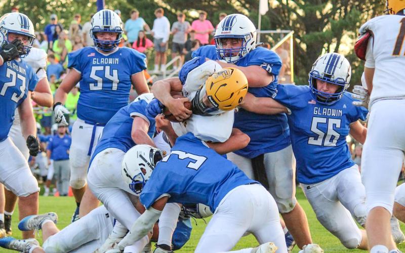 The Gladwin Flying G’s tackle the opposing Ogemaw player at the season opener on August 25. PHOTO PROVIDED BY KIERSTIN HALE