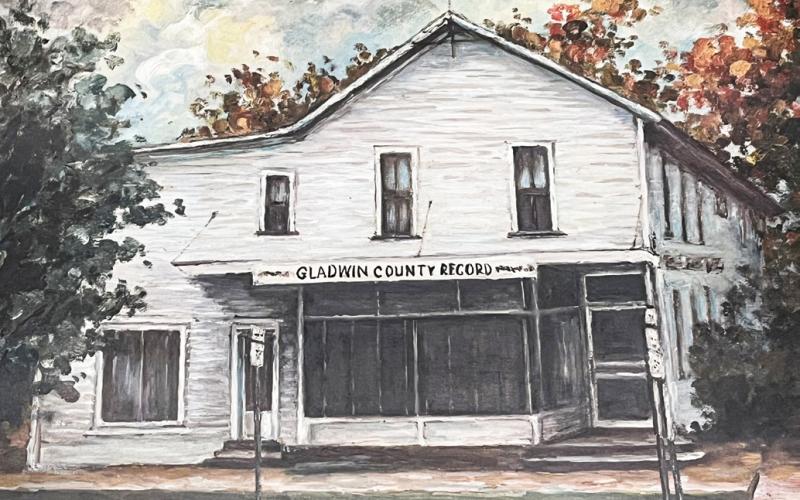 A painting of The Record building that was located at the corner of Cedar Avenue and Bowery Street. It hangs in the front reception area of The Record.