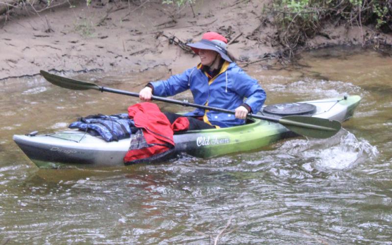 Chilly weather and the threat of rain required paddlers to gear up for the Second Annual River Race of Two Cities Saturday.