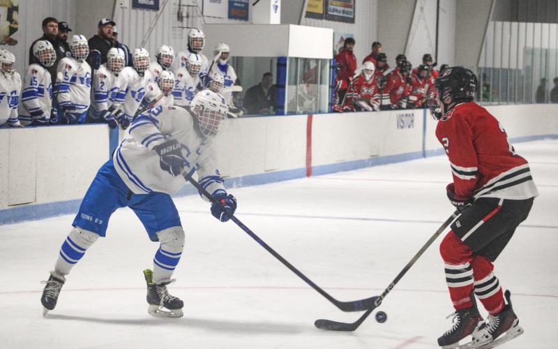 Gladwin’s Jeff Zeitz lets one go from the face-off circle during last week’s victory over the FNV Griffins.