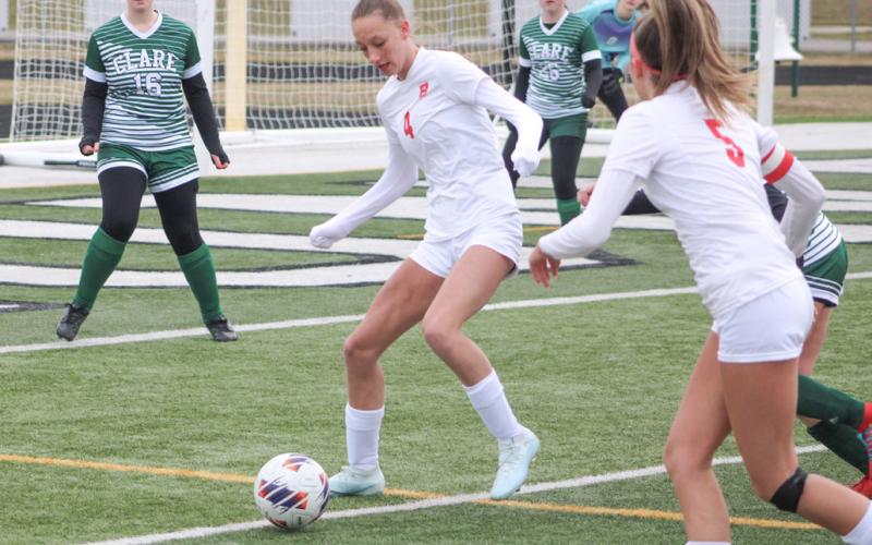 Beaverton’s Trinity Danielak gets control of the ball in front of Clare’s net during last week’s season-opener.