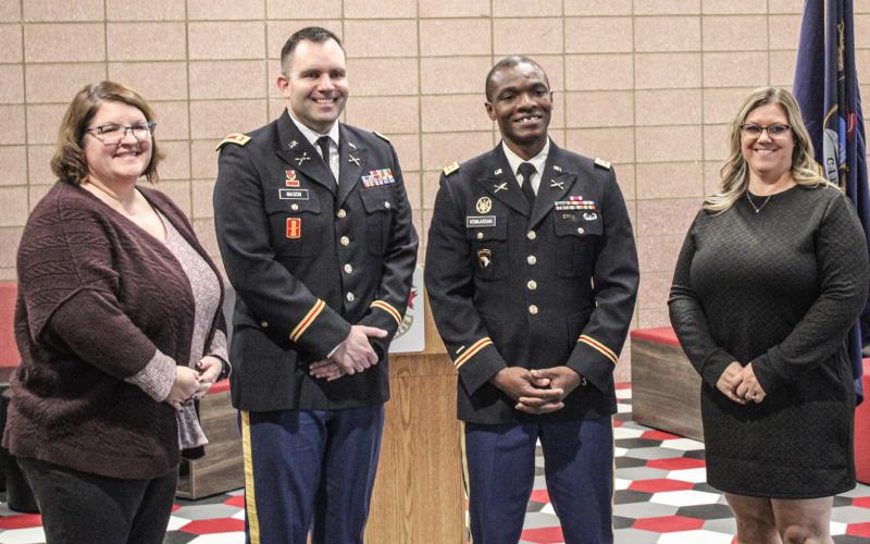 Newly-promoted Major Kossi Komlassan meets with his bosses (left to right) Beaverton High School Assistant Principal Kristen Sanderson, Lt. Col. Peter Mason, Komlassan and Beaverton Principal Renee Inscho after last week’s ceremony.