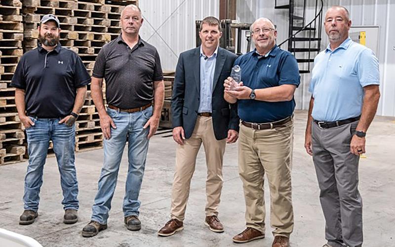 MDARD Director Tim Boring presents the 2026 Ag Exporter of the Year Award to Freeland Bean &amp;amp; Grain Marketing Manager Roger Hupfer at a ceremony in Freeland, MI on Aug. 12, 2026.